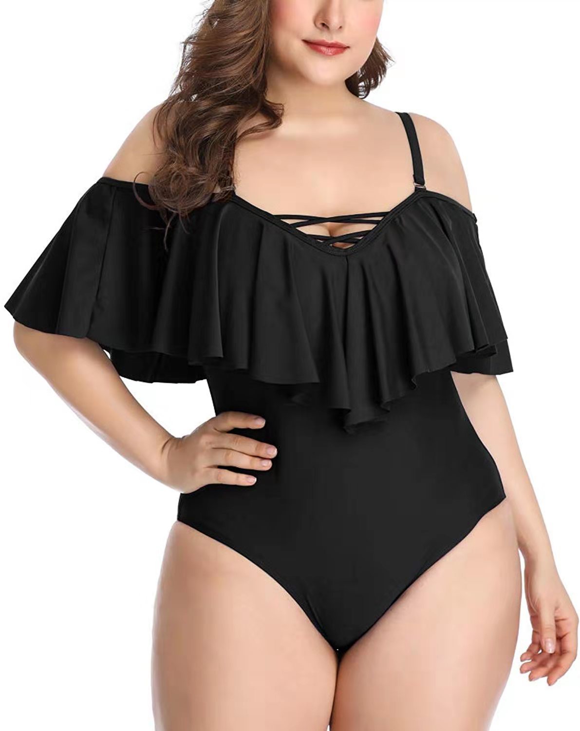 Bikini de talla grande con volantes y diseño cruzado en color liso.