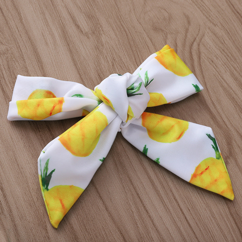 Conjunto de traje de baño infantil con estampado de piña y tirantes con borlas