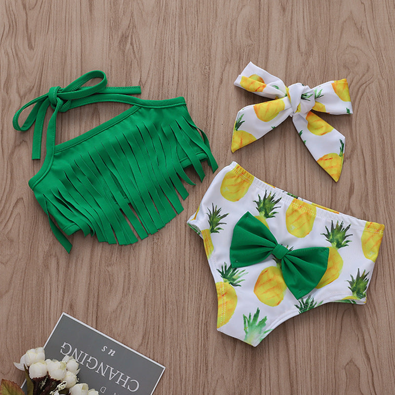Conjunto de traje de baño infantil con estampado de piña y tirantes con borlas