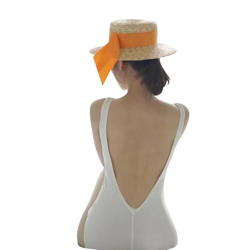 Traje de baño negro de una pieza sin espalda para mujer, ideal para spa.