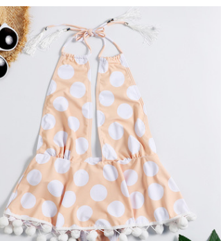 Traje de baño de una pieza retro con lunares: fresco y sexy.