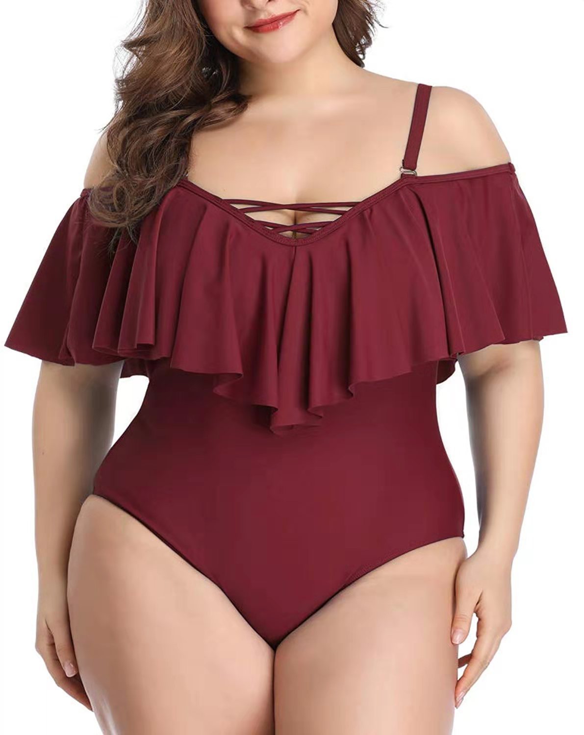 Bikini de talla grande con volantes y diseño cruzado en color liso.